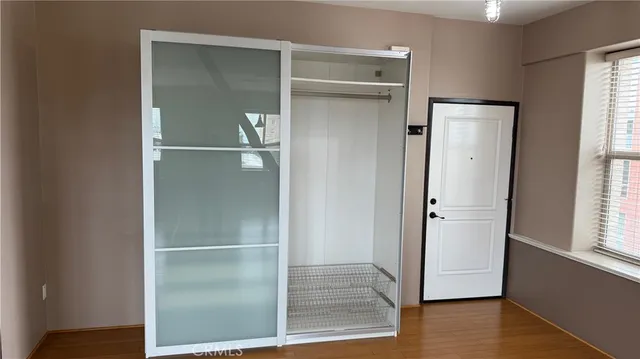 a view of walk in closet with window