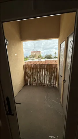 a view of a balcony with an outdoor space