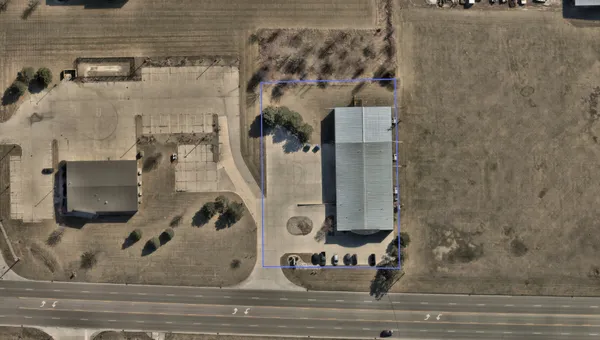 a white sink sitting next to a bathroom sink