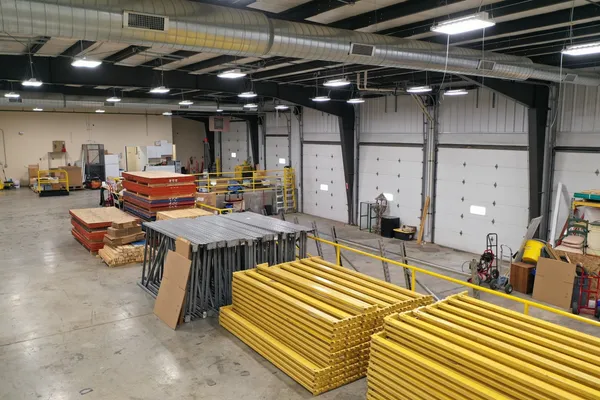 a lobby with furniture and a rug