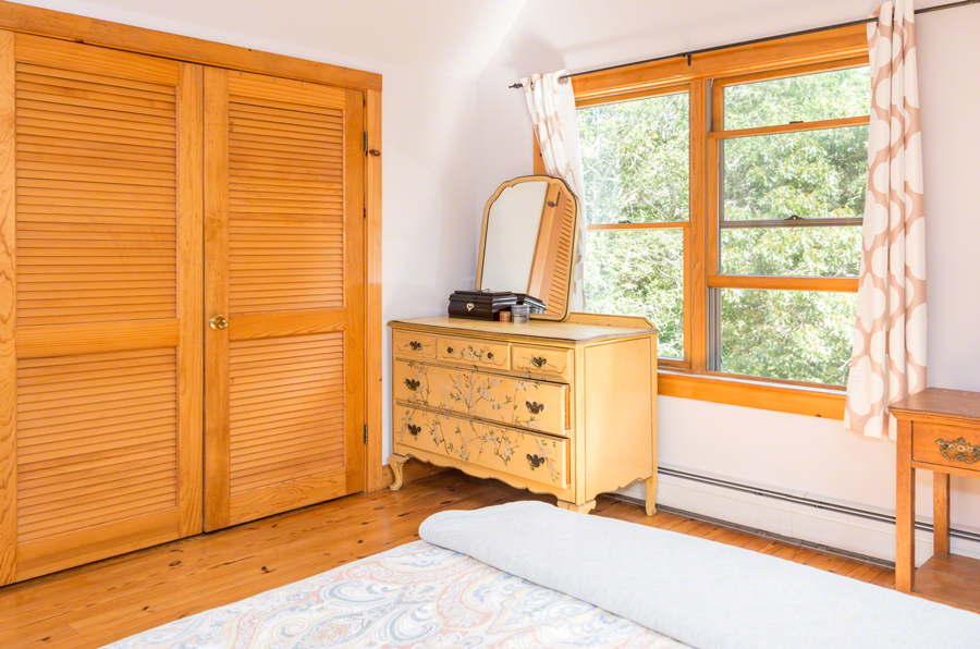 15 Meshacket Road Edgartown, MA 02539 - Photo 12 of 19 a view of a bedroom with windows