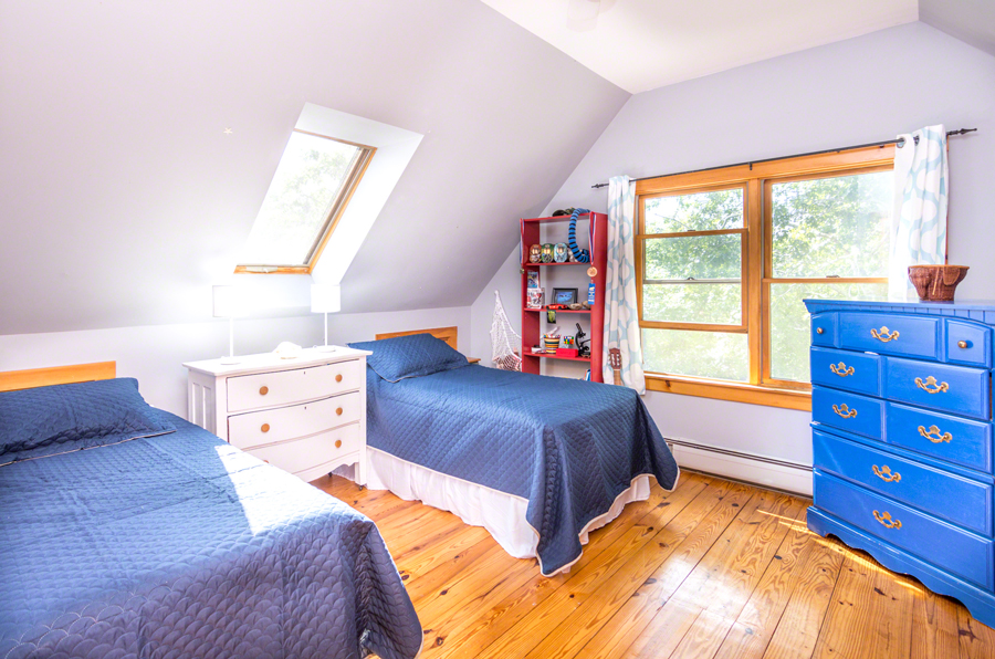 15 Meshacket Road Edgartown, MA 02539 - Photo 13 of 19 a bedroom with a bed and a window