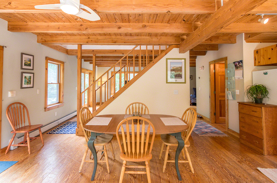 15 Meshacket Road Edgartown, MA 02539 - Photo 6 of 19 a view of a dining room with furniture and wooden floor