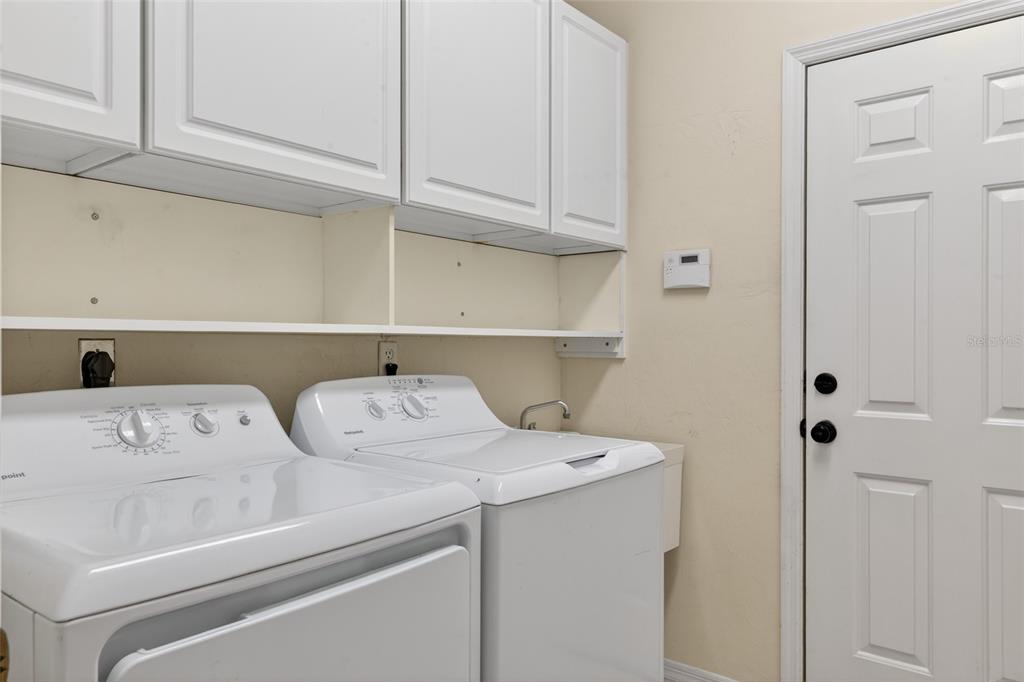 9626 Southwest 53rd Road Gainesville, FL 32608 - Photo 21 of 23 a utility room with dryer and washer