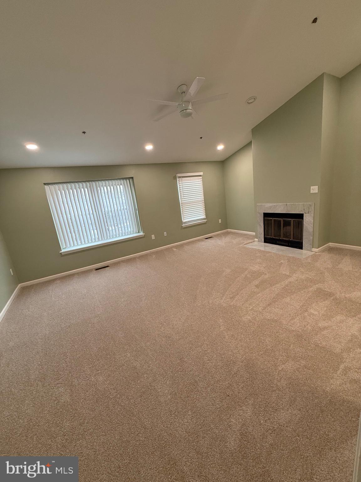 11281 Raging Brook Drive, Unit 307 Bowie, MD 20720 - Photo 9 of 11 a view of an empty room with a window