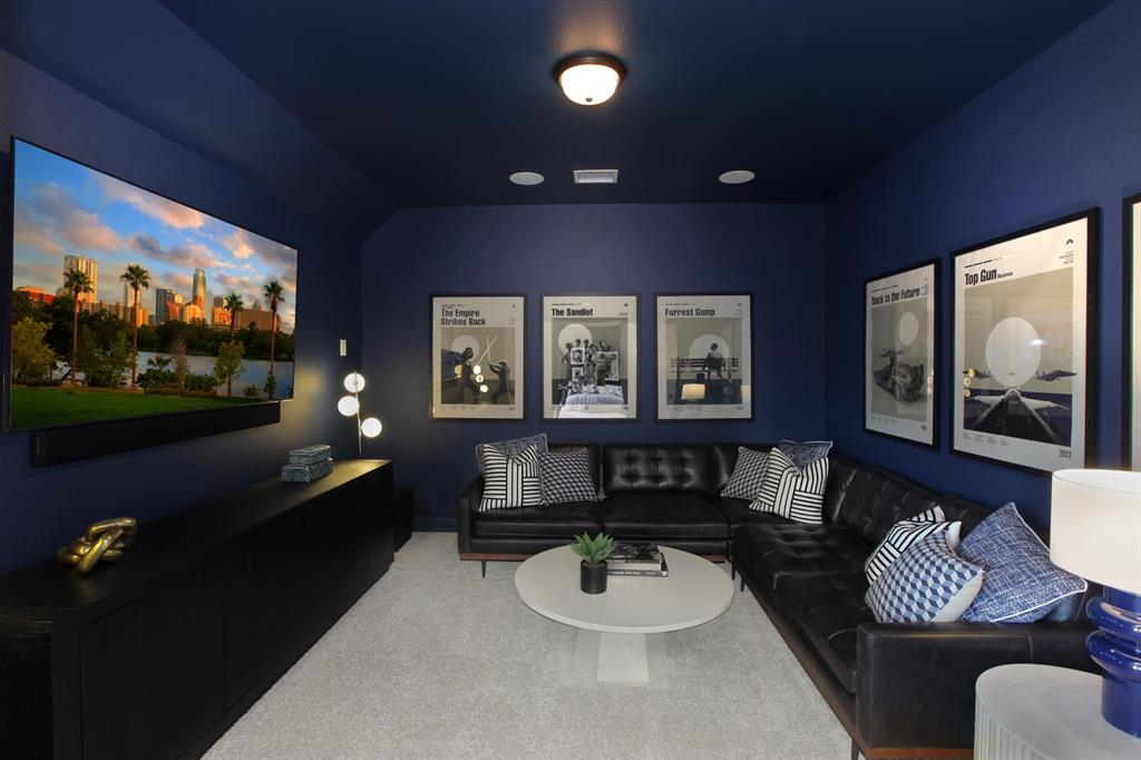 240 South Bee Balm Road McKinney, TX 75071 - Photo 16 of 23 a living room with furniture and a flat screen tv