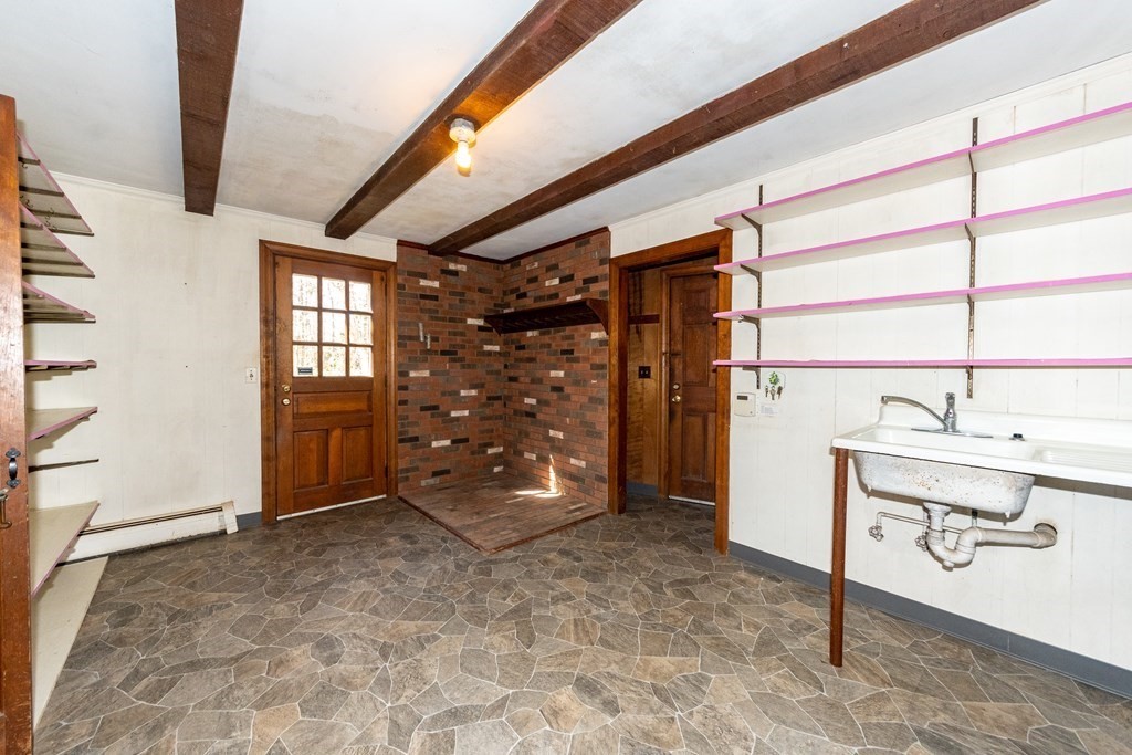 1489 Main Road Westport, MA 02790 - Photo 13 of 24 a view of an empty room and window