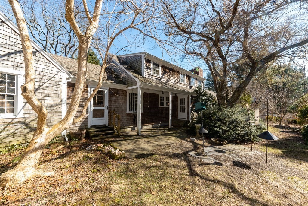1489 Main Road Westport, MA 02790 - Photo 22 of 24 a front view of a house with a yard