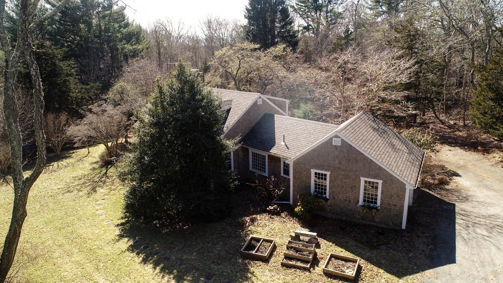 1489 Main Road Westport, MA 02790 - Photo 3 of 24 a front view of a house with a yard