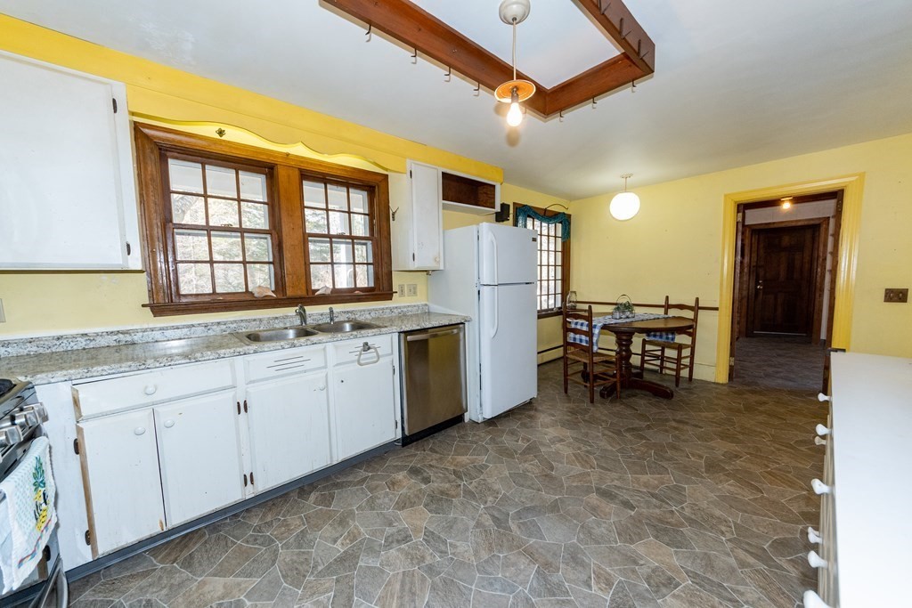 1489 Main Road Westport, MA 02790 - Photo 5 of 24 a kitchen with sink and cabinets