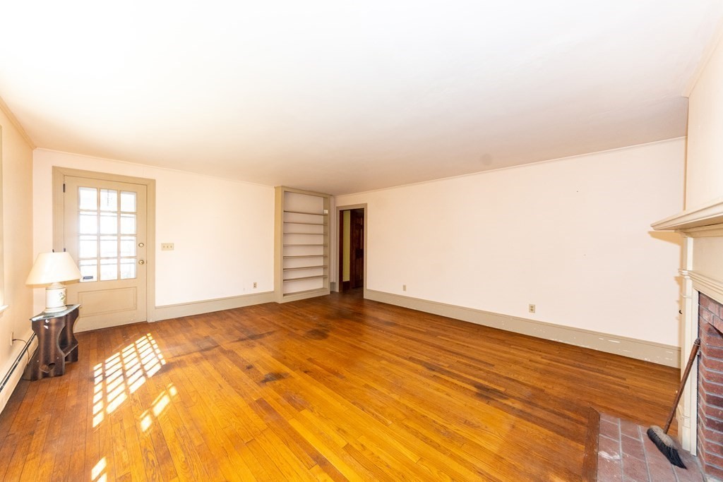 1489 Main Road Westport, MA 02790 - Photo 10 of 24 a view of an empty room and window
