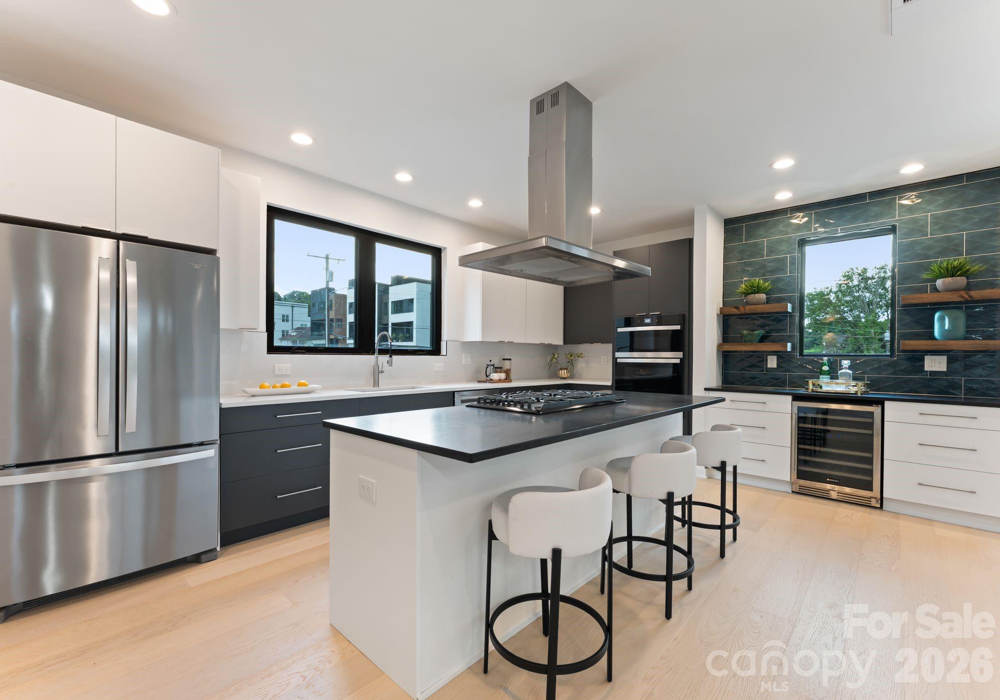 412 State Street Charlotte, NC 28208 - Photo 1 of 31 a kitchen with stainless steel appliances granite countertop a stove and a refrigerator