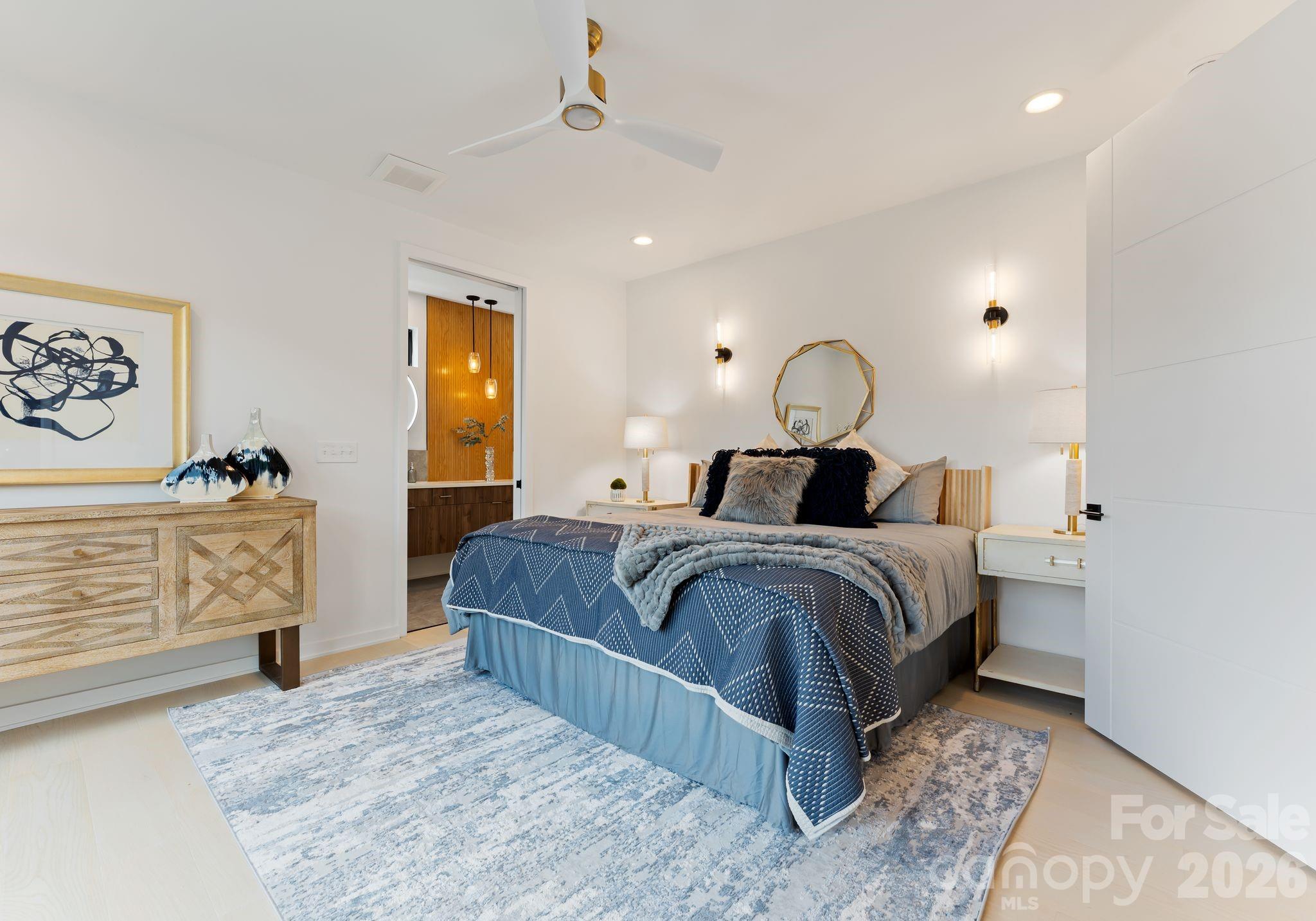 412 State Street Charlotte, NC 28208 - Photo 15 of 31 a bed room with a bed and painting on the wall