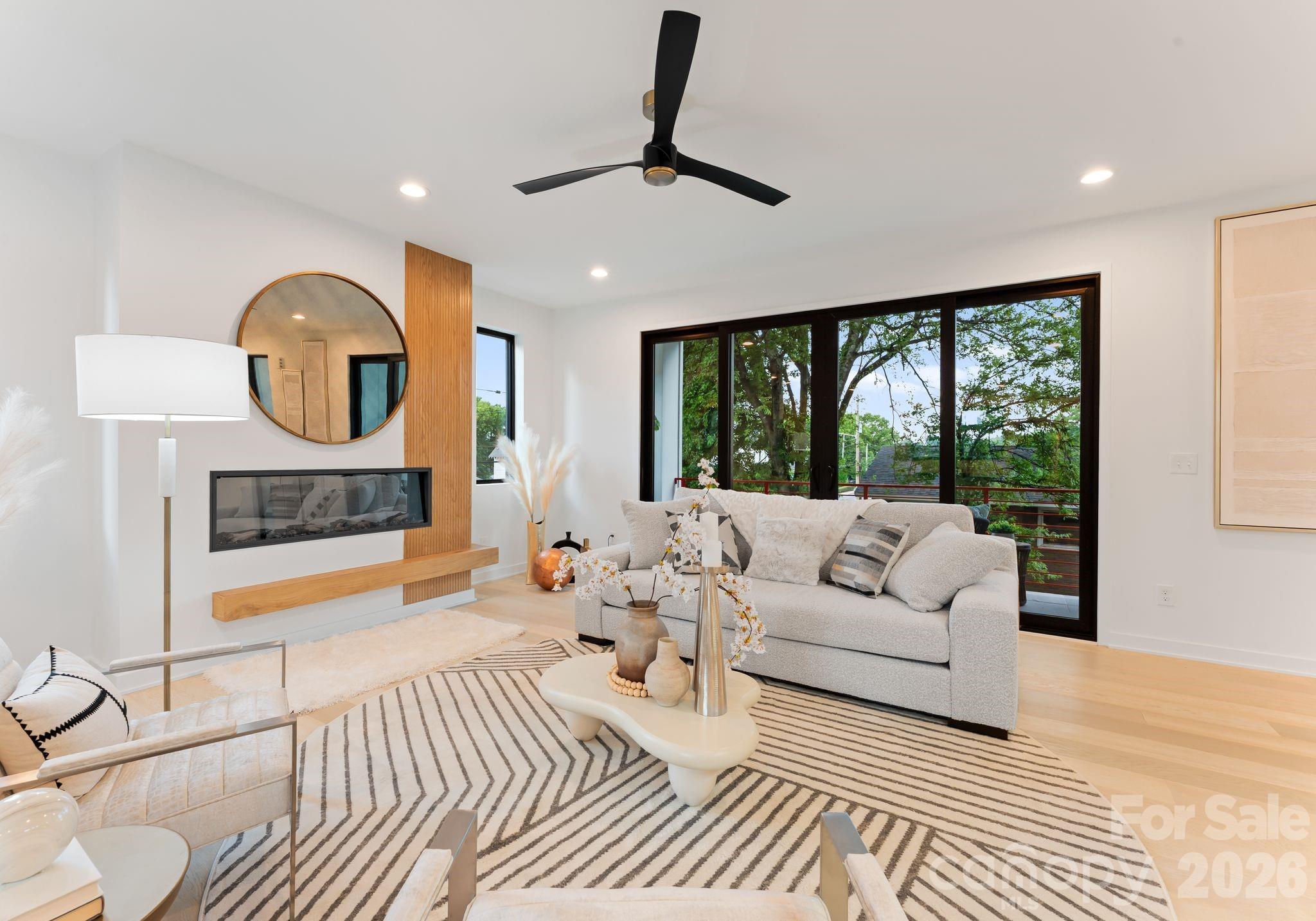 412 State Street Charlotte, NC 28208 - Photo 2 of 31 a living room with furniture and a large window