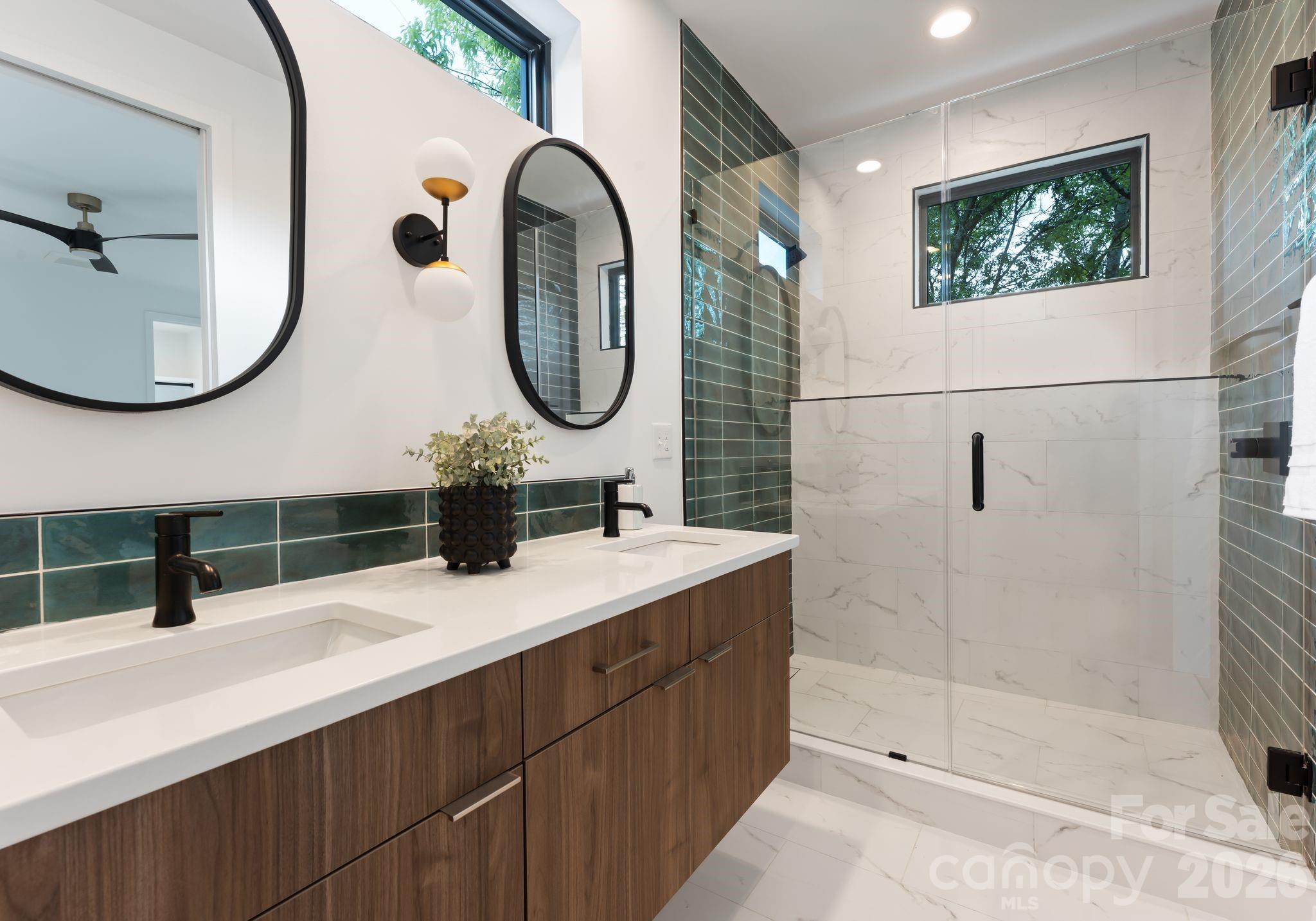 412 State Street Charlotte, NC 28208 - Photo 26 of 31 a bathroom with a sink and a mirror