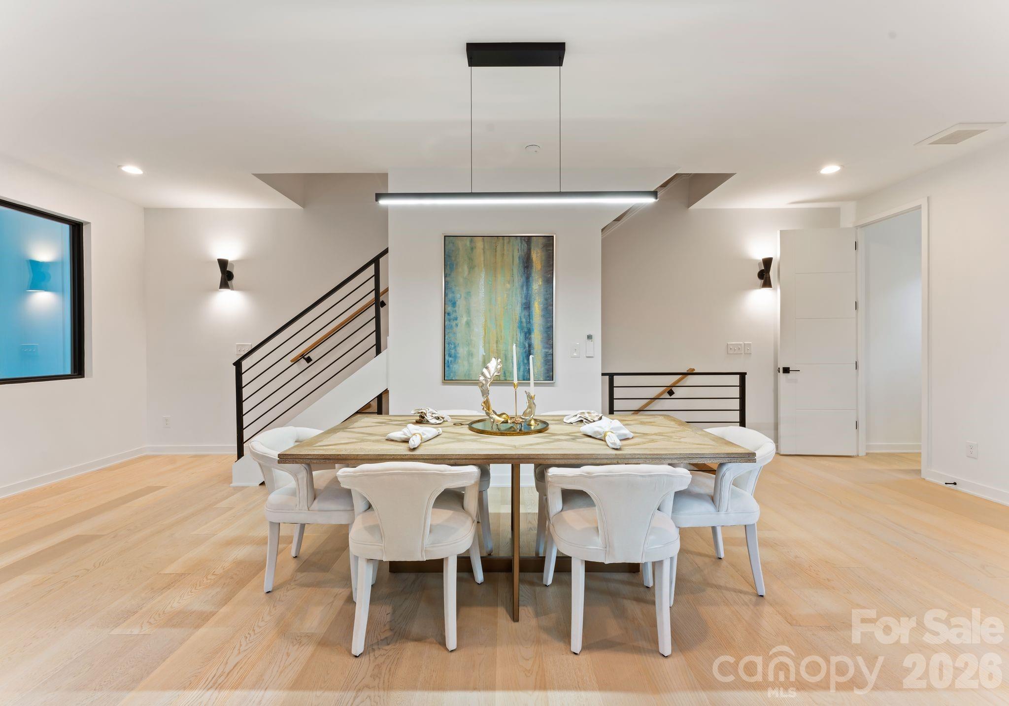 412 State Street Charlotte, NC 28208 - Photo 8 of 31 a dining room with a table and chairs