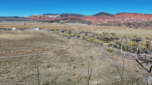 890 East Hatchery Road Bicknell, UT 84715 - Photo 20 of 48 View of mountain backdrop with rural landscape