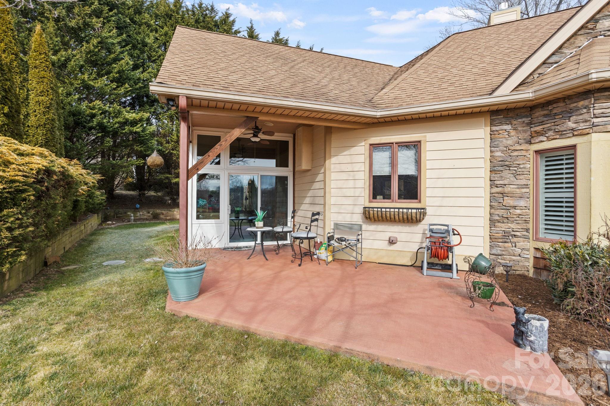 628 Vista Falls Road Mills River, NC 28759 - Photo 29 of 37 a view of a house with backyard porch and sitting area