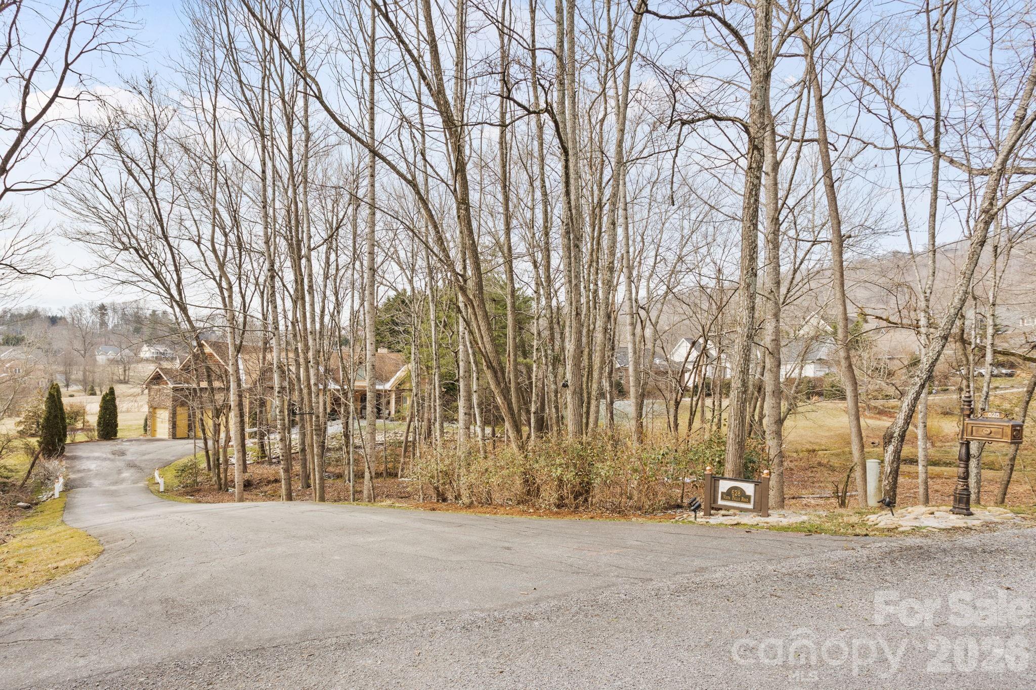 628 Vista Falls Road Mills River, NC 28759 - Photo 37 of 37 an outdoor space with lots of trees