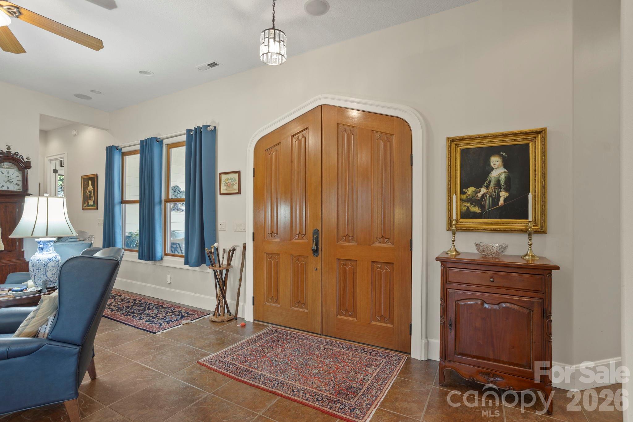 628 Vista Falls Road Mills River, NC 28759 - Photo 7 of 37 a view of a hallway with furniture and windows