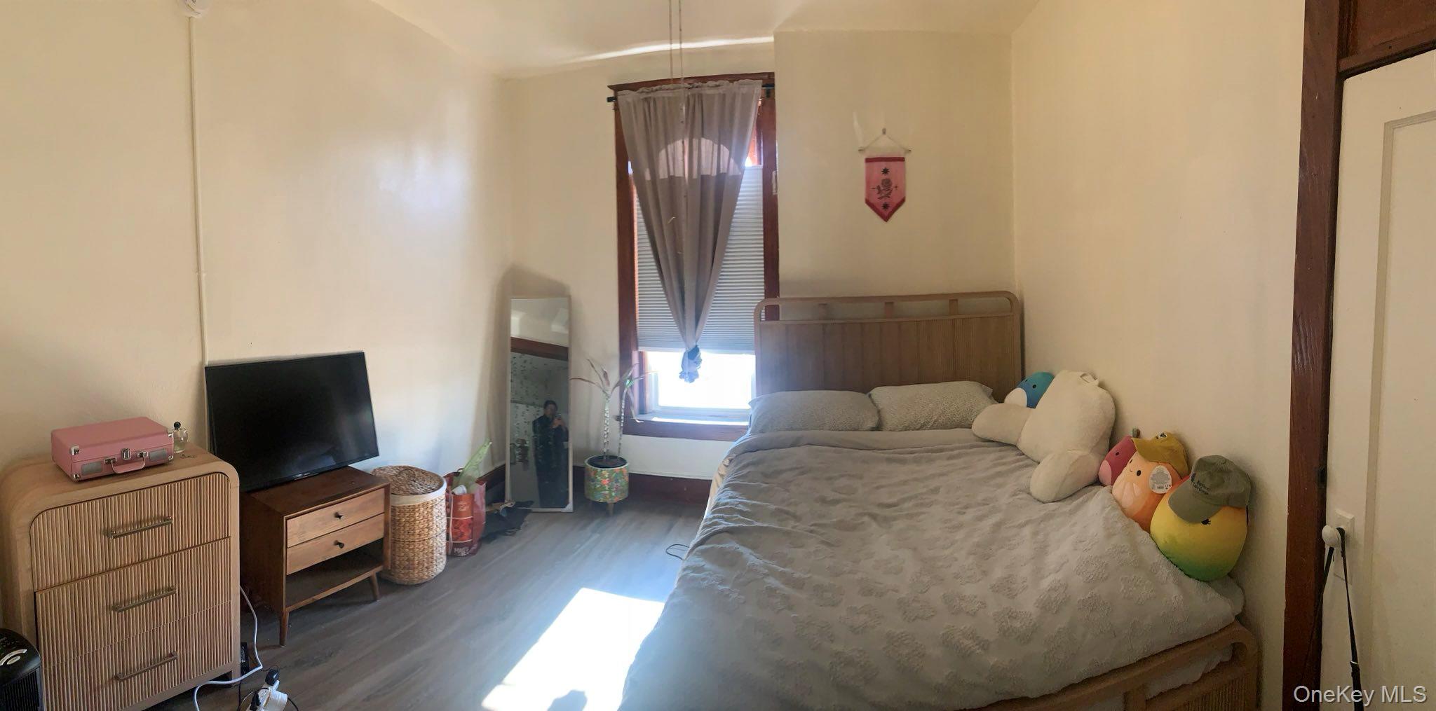 21 West Main Street, Unit B Middletown, NY 10940 - Photo 6 of 7 Bedroom with dark wood-style floors