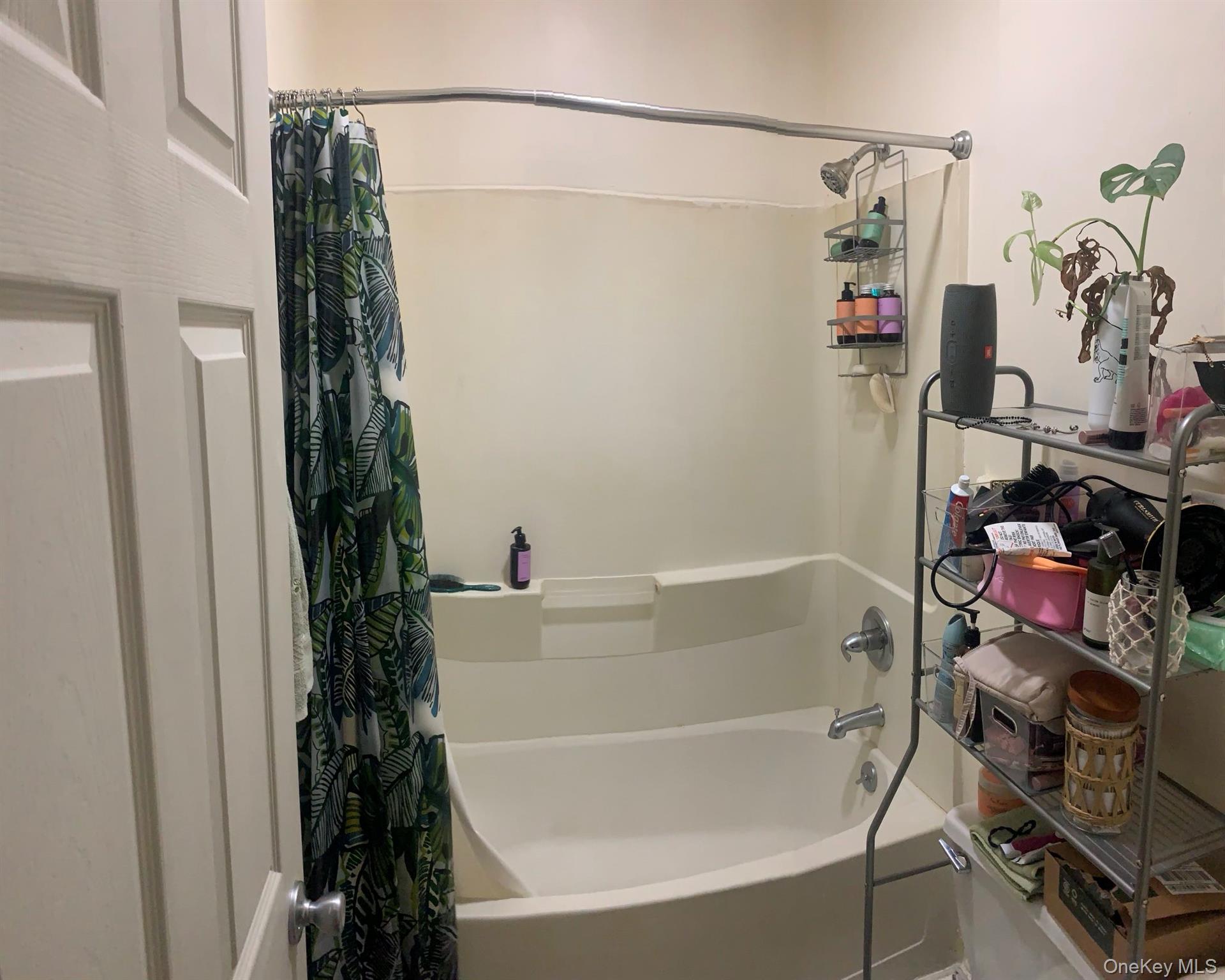 21 West Main Street, Unit B Middletown, NY 10940 - Photo 7 of 7 Full bathroom featuring shower / bathtub combination with curtain