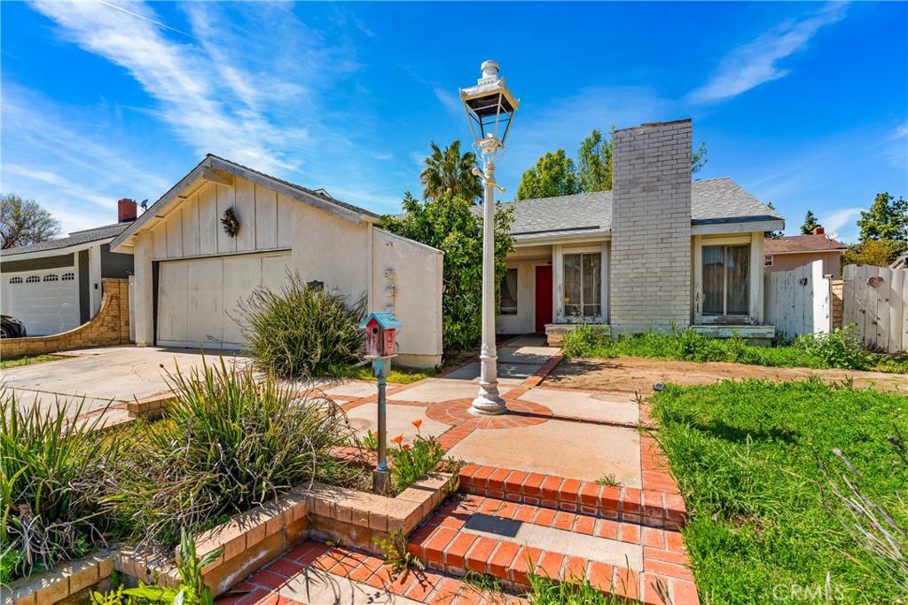 23649 Mill Valley Road Valencia, CA 91355 - Photo 1 of 1 a house view with a outdoor space
