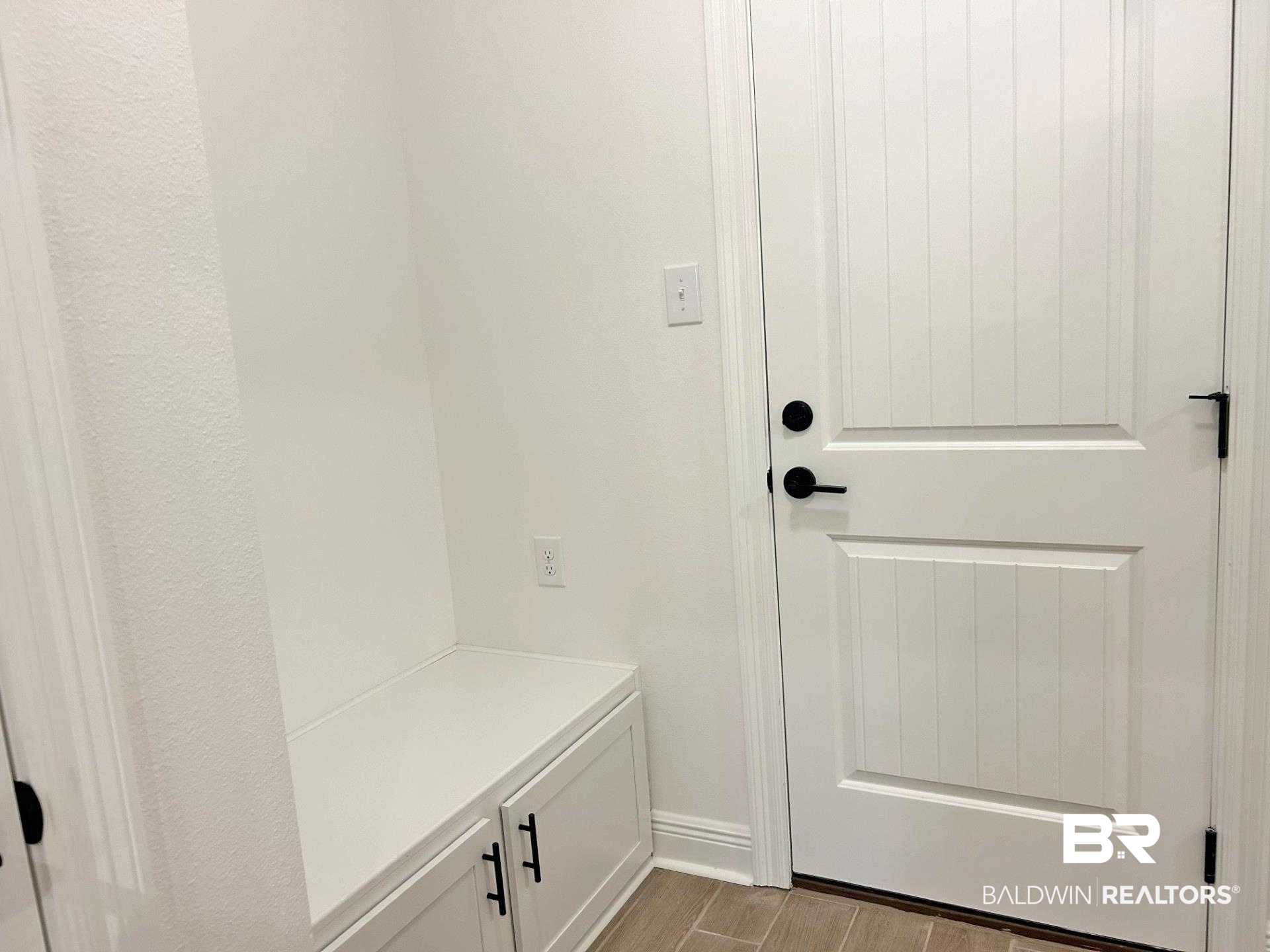1744 Breckinridge Place Foley, AL 36535 - Photo 23 of 26 Mudroom with wood tiled floors and baseboards