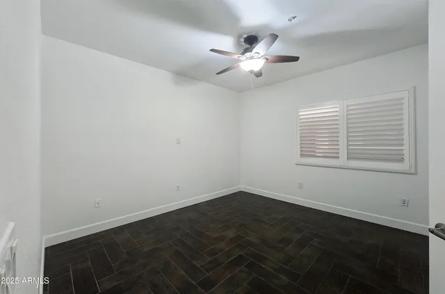 a view of a room that has a window in it