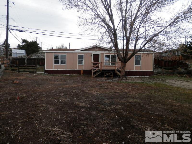 1608 Collins Circle Reno, NV 89506 - Photo 1 of 1 a view of a house with a yard