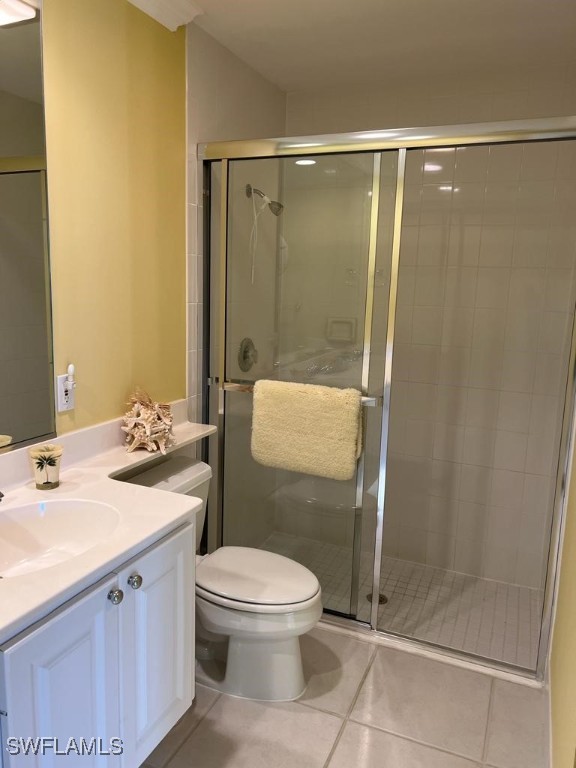 3013 Futuna Lane Naples, FL 34119 - Photo 18 of 21 a bathroom with a sink a toilet and shower