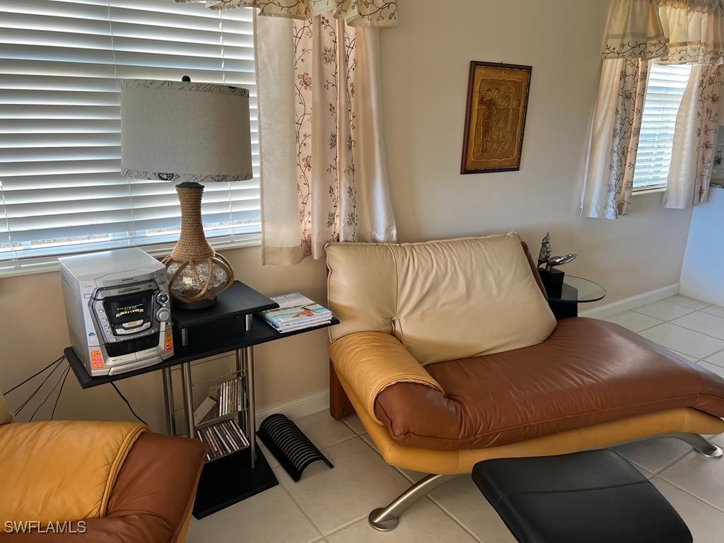 3013 Futuna Lane Naples, FL 34119 - Photo 6 of 21 a living room with furniture