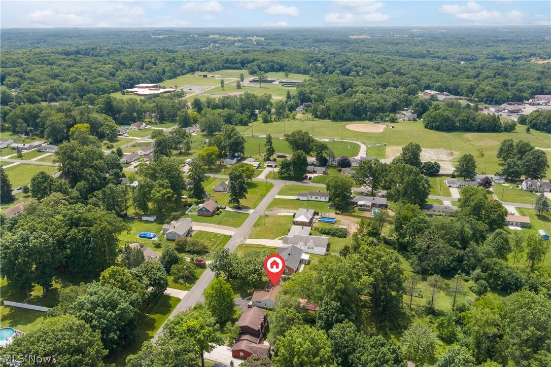 5768 Nolley Road Akron, OH 44319 - Photo 34 of 38 Aerial perspective of a residential neighborhood featuring established homes and mature trees