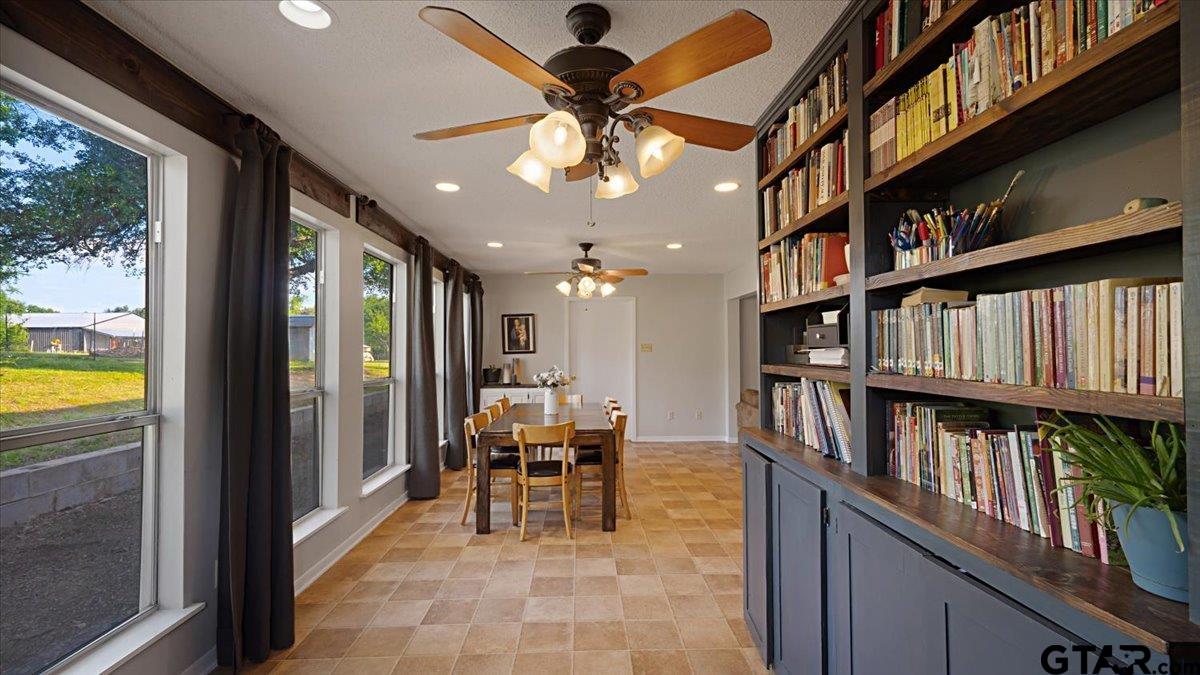 8192 County Road 428 Tyler, TX 75704 - Photo 12 of 38 a view of a livingroom with furniture and staircase