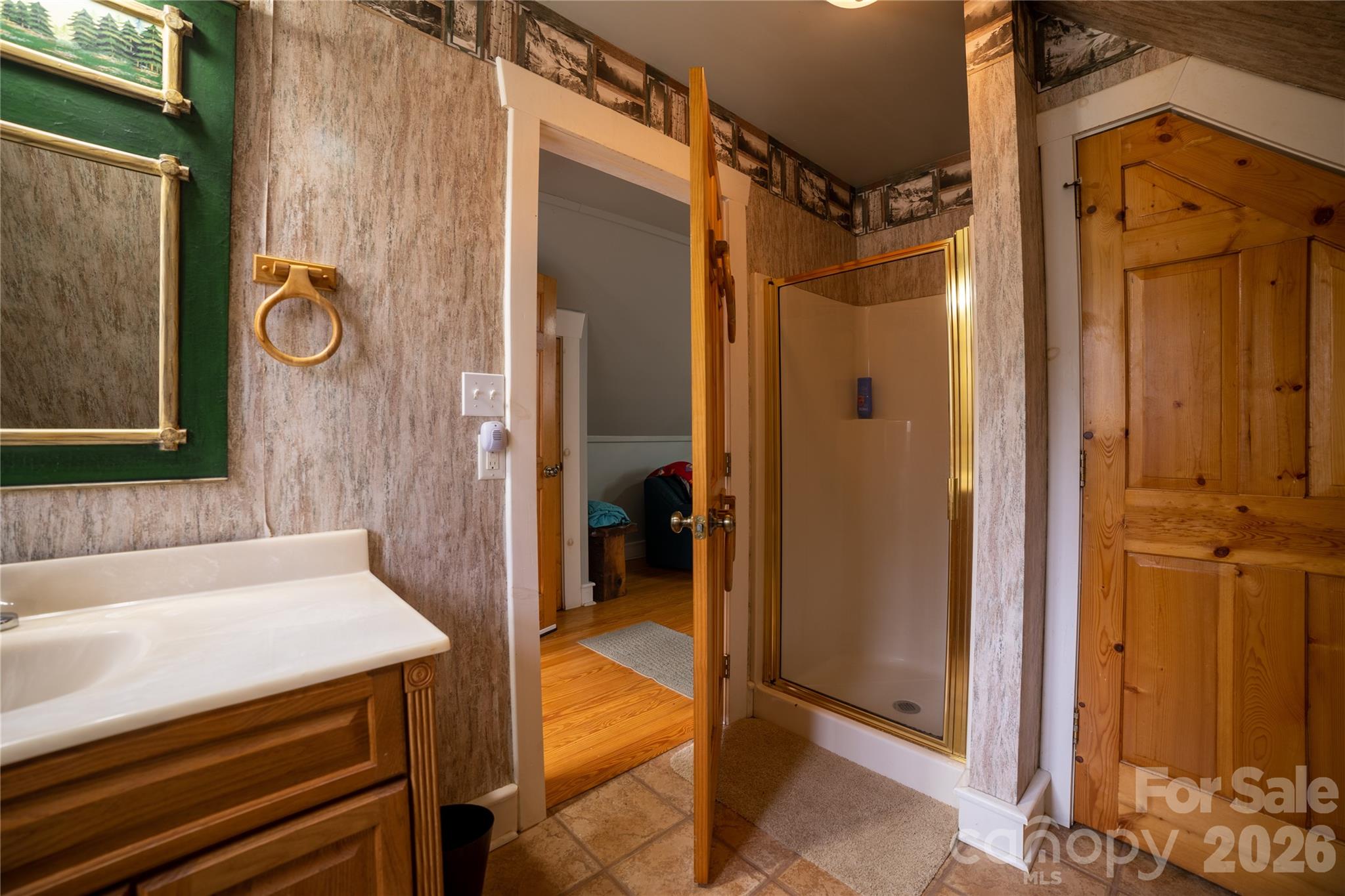 682 Rock House Road Hot Springs, NC 28743 - Photo 35 of 43 a bathroom with a tub and shower