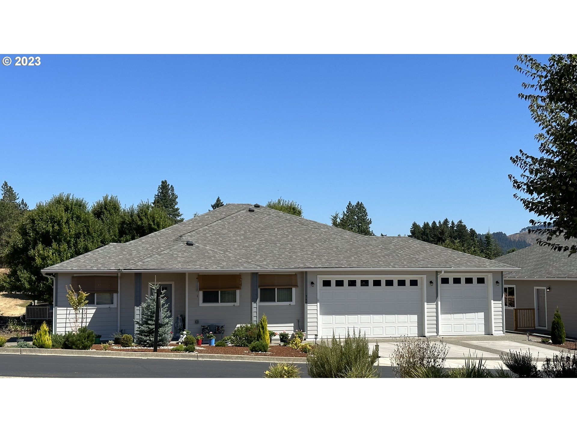a house view with a garden