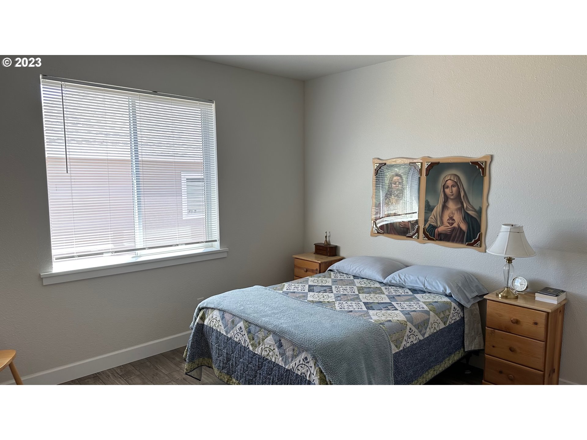 746 Divot Loop Sutherlin, OR 97479 - Photo 14 of 32 a bedroom with a bed and a window