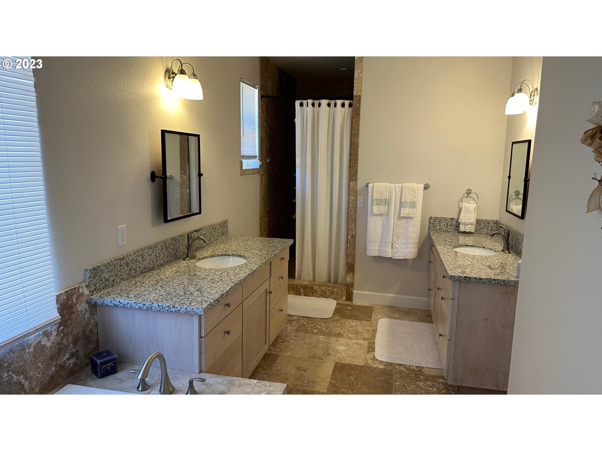 746 Divot Loop Sutherlin, OR 97479 - Photo 6 of 32 a open kitchen with sink and refrigerator