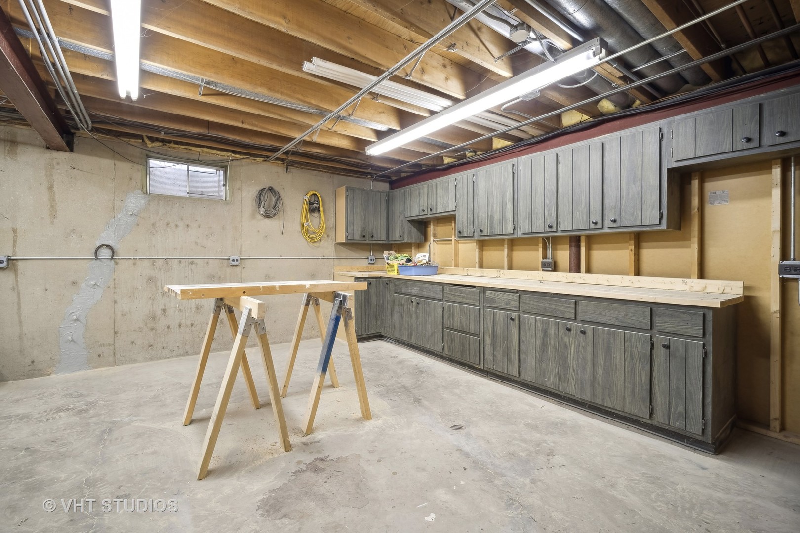 1059 Branch Road Gurnee, IL 60031 - Photo 19 of 28 a kitchen with a sink a counter space stainless steel appliances and cabinets