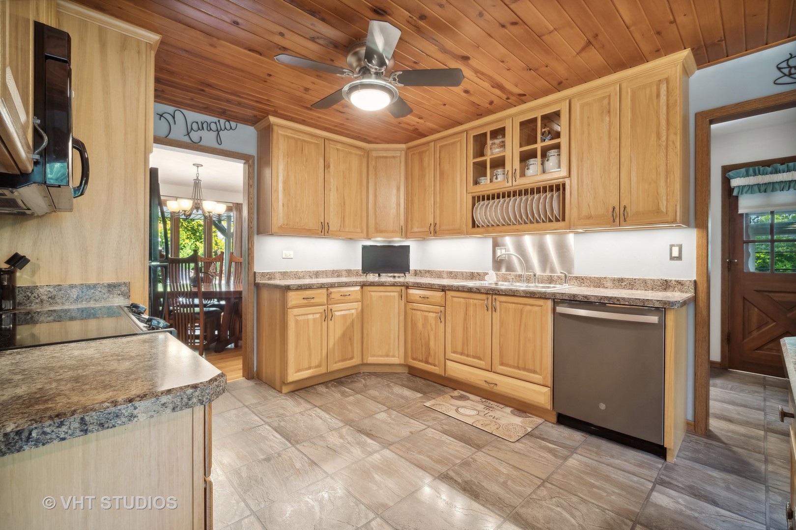 1059 Branch Road Gurnee, IL 60031 - Photo 10 of 28 a kitchen with a sink stove and cabinets