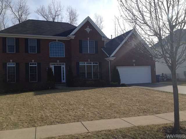 Exterior Front Traditional brick front colonial, F