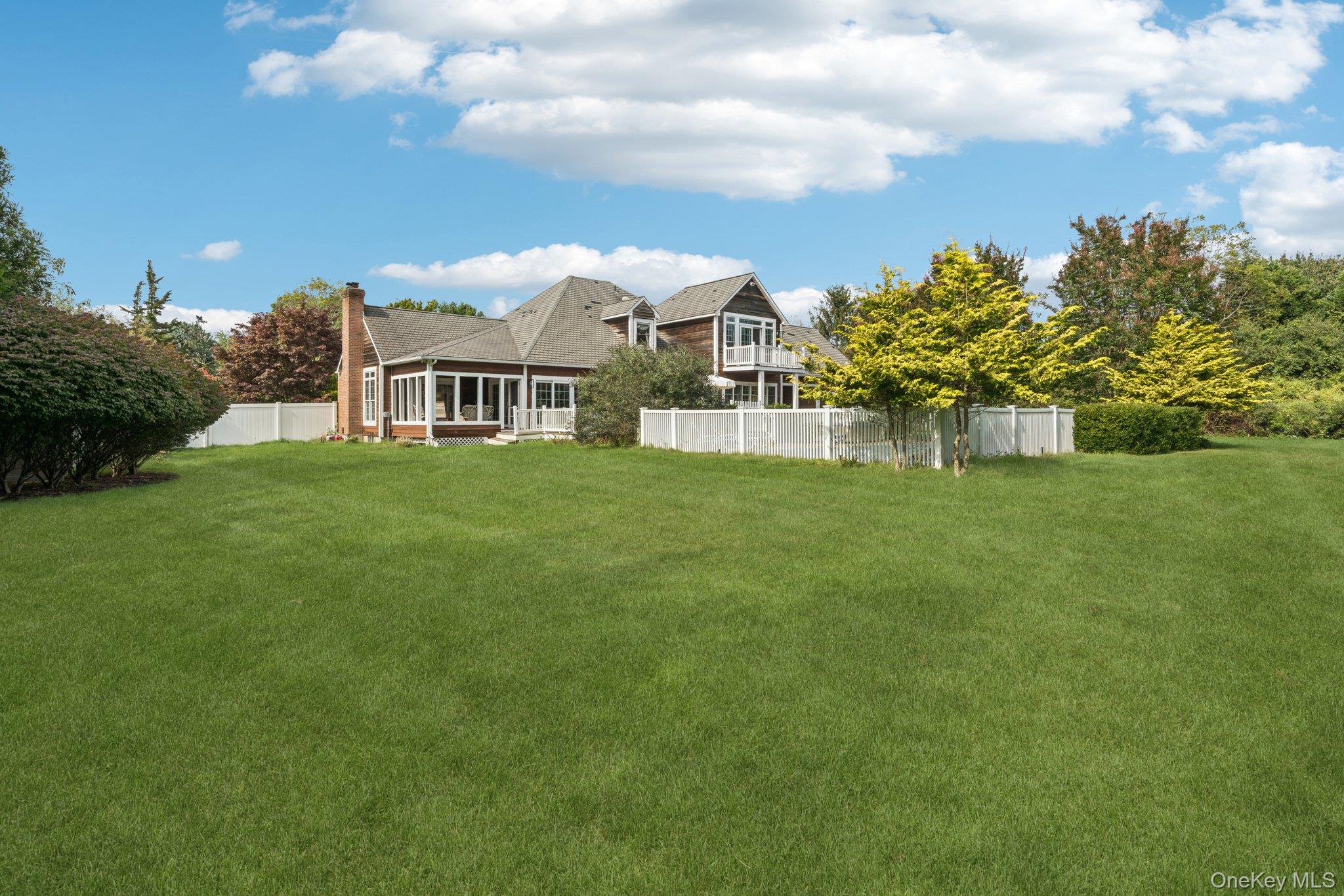12 Laila Lane Remsenburg, NY 11960 - Photo 41 of 50 a view of a house with a big yard
