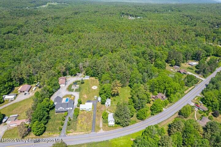 315 North Greenfield Road Greenfield, NY 12859 - Photo 3 of 11 an aerial view of residential houses with outdoor space and trees