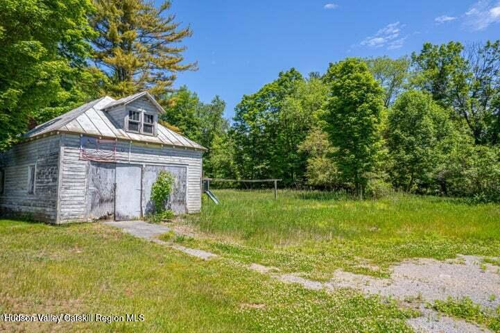 315 North Greenfield Road Greenfield, NY 12859 - Photo 4 of 11 a front view of a house with a yard