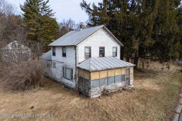 315 North Greenfield Road Greenfield, NY 12859 - Photo 6 of 11 a view of backyard with a barn and large trees
