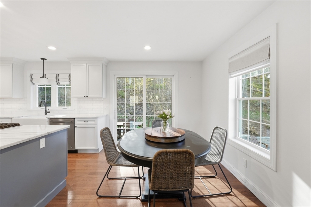 103 Rice Corner Road Brookfield, MA 01506 - Photo 12 of 39 a view of a dining room with furniture and a window
