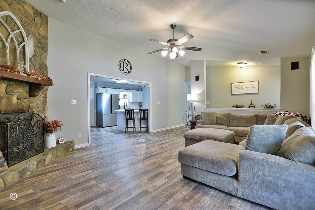 129 Hunter Road Cataula, GA 31804 - Photo 12 of 28 a living room with furniture and a wooden floor
