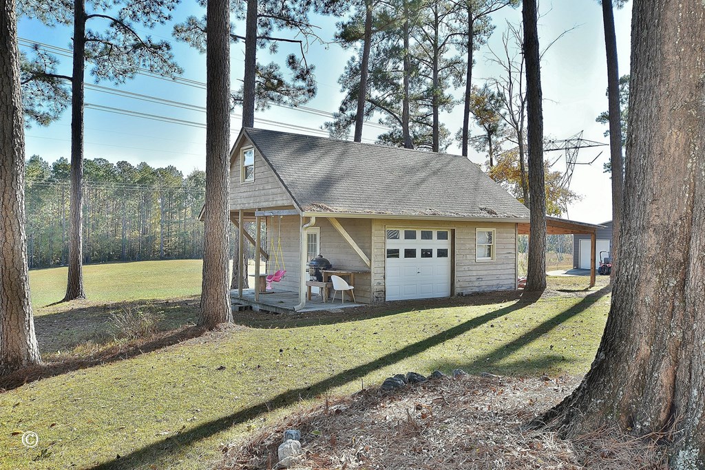 129 Hunter Road Cataula, GA 31804 - Photo 4 of 28 a view of a house with a yard