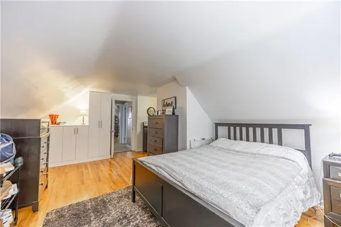 a bathroom with a sink toilet and a mirror