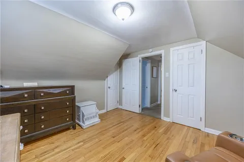 a view of a patio with a table chairs and a backyard